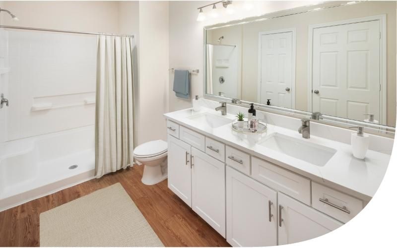 Bathroom options with thoughtful details a bathroom with a tub sink and toilet