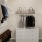 a closet with clothes