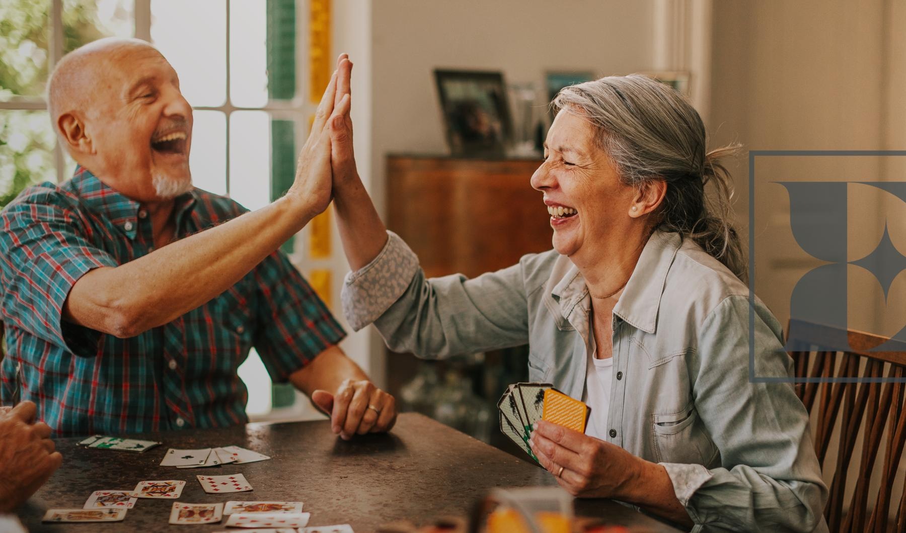 Find your perfect fit at Elate Royal Oaks a man and a woman playing a board game