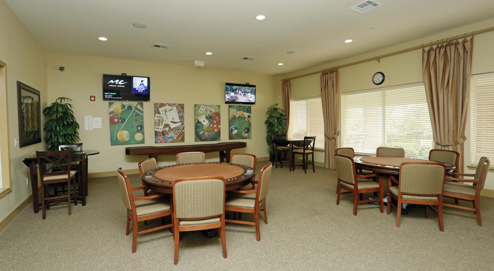 Everything within reach a common room with tables and chairs