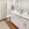a bathroom with a tub sink and toilet