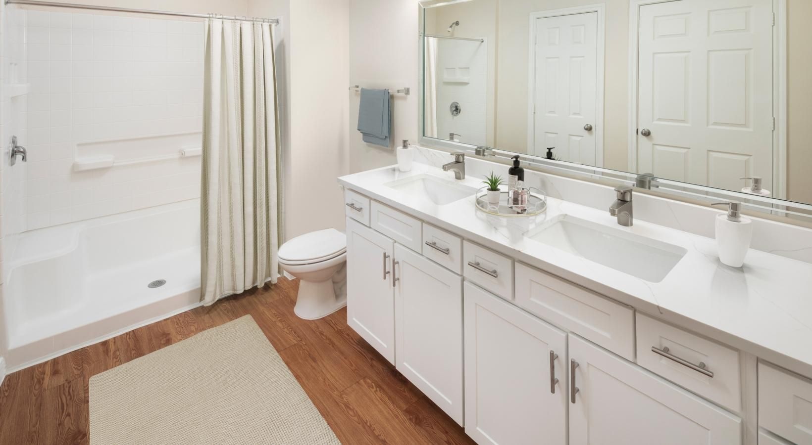 Spacious bathrooms with everything you need a bathroom with a tub sink and toilet