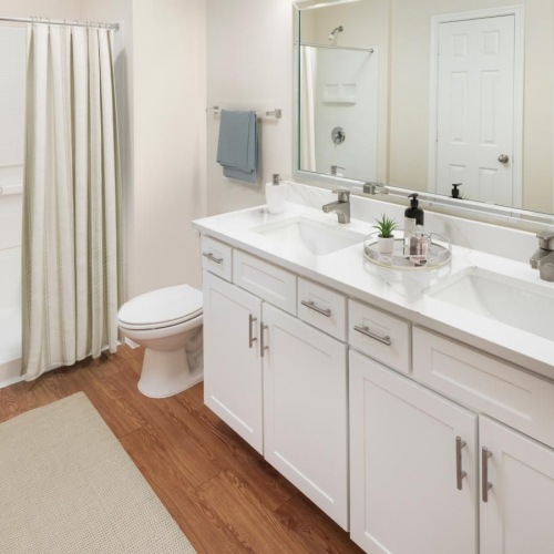 Spacious bathrooms with everything you need a bathroom with a tub sink and toilet