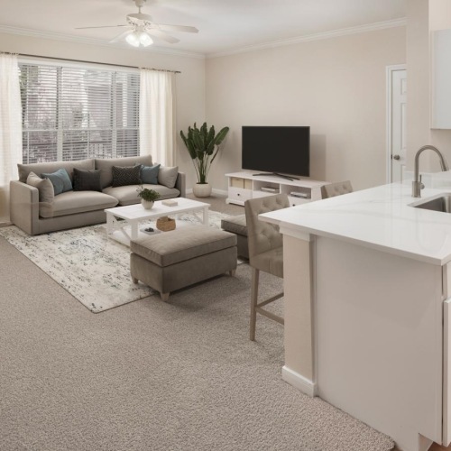Spacious living areas to recline and recharge a living room with a couch and a dining table